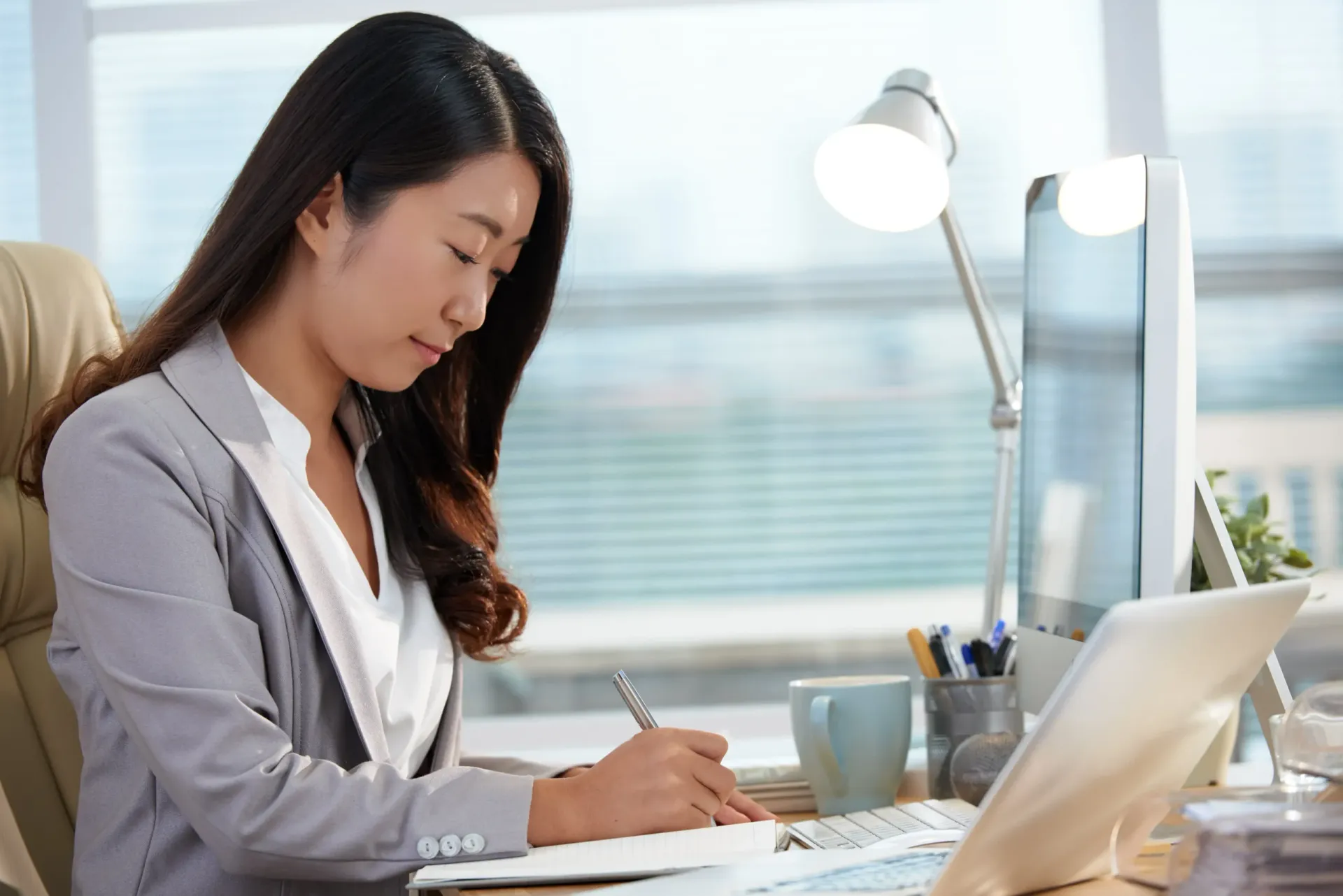 Corporate secretarial and accounting professionals discussing Singapore compliance documents